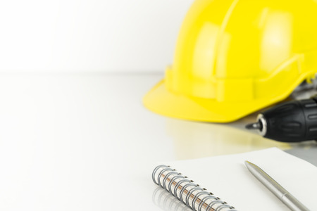 Repairman construction helment and screwdriver with copy spaceの写真素材