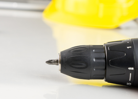 construction safety helment and screwdriver with copy spaceの写真素材