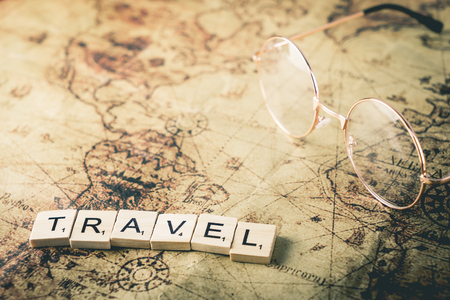 Vacation concept text on vintage map with copy spaceの写真素材