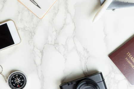 Luxury traveler objects on marble surface with copy spaceの写真素材