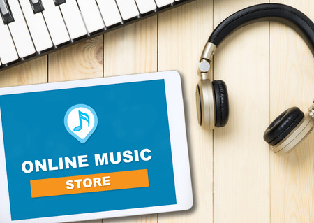 Online Music Store on Table with Music accessoriesの写真素材