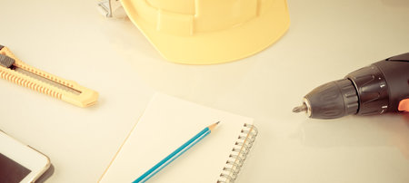 Engineering repair tools with notebook and pencil