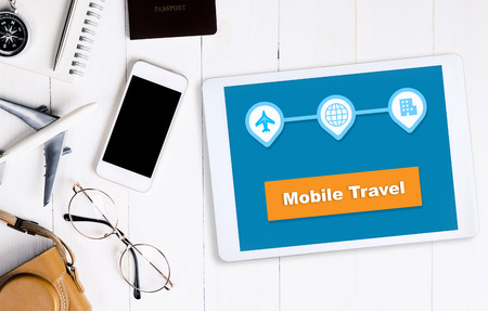 Travel booking using application on tabletの写真素材