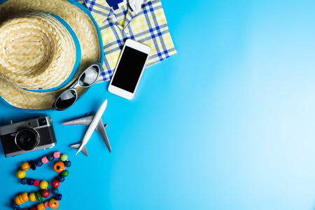 Summer travel fashion and accessories on blueの写真素材