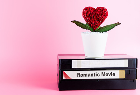 Romantic movie video tape with heart flower copy spaceの写真素材