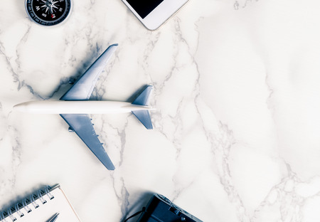 Air Travel acccessories on luxury marble with copy spaceの写真素材