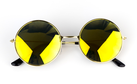 Yellow shade sunglasses isolated on white backgroundの写真素材