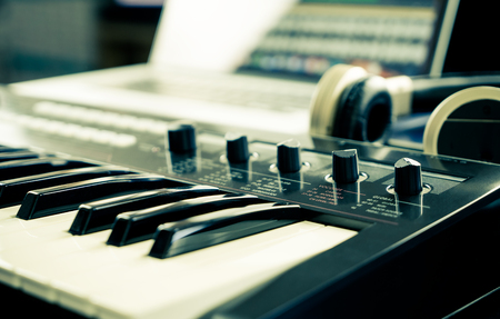 Synthesizer keyboard on home music studio set upの写真素材