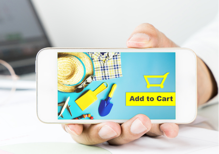Business man is holding Summer shopping application on smartphoneの写真素材