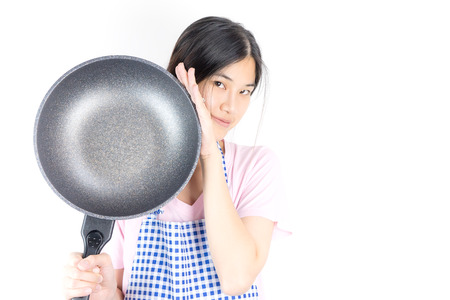 Asian housewife cooker with cooking pan isolated on white copy spaceの写真素材
