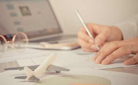 Business man is signing documents for his Business travel tripの写真素材