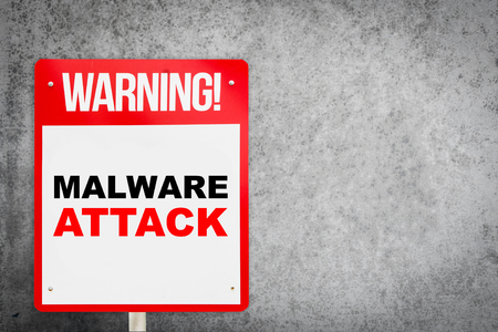 Street Warning Sign on Malware Attack with copy spaceの写真素材