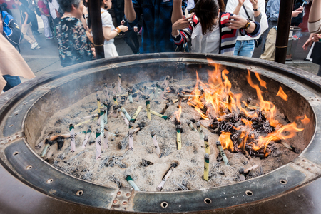 Tokyo, Japan - May 1, 2017: Tourists and Local are worshiping the shrine through the incense in Sensoji Shrine.のeditorial素材