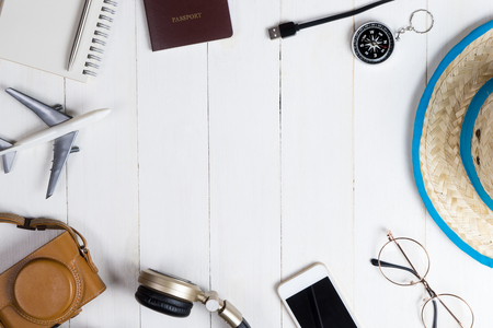 Travel fashion and accessories on white wooden copy spaceの写真素材