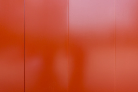 Shiney red metal plate for texture and backgroundの写真素材