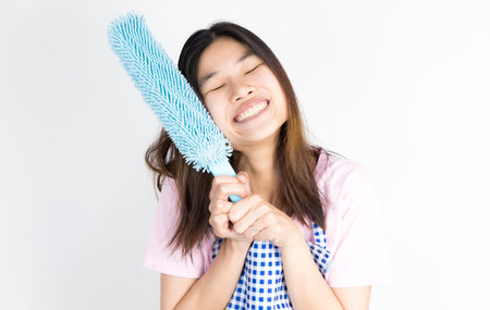 Happy House wife maid ready to clean up isolated on white