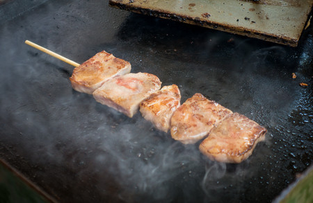 Cooking Japanese Grill beef on a BBQ hot panの写真素材