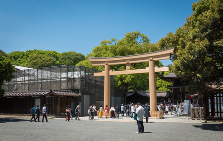 Tokyo, Japan - May 5, 2017: Tourists are entering the Meiji Shrine through the wooden gate.のeditorial素材