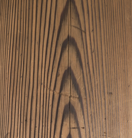 Old Brown Wooden surface texture with scratchesの写真素材