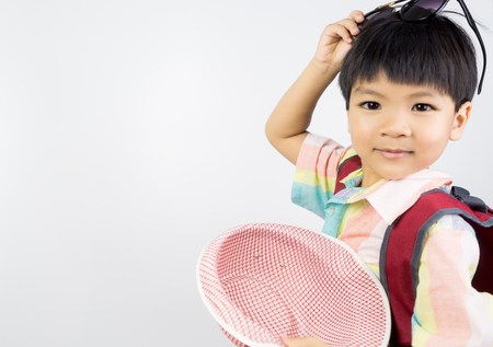 Asian boy Backpacker is ready to travel, with copy spaceの写真素材