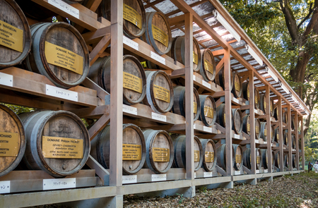 Tokyo, Japan - May 5, 2017: The Wooden wine barrels storage in Meiji Shrine park.のeditorial素材