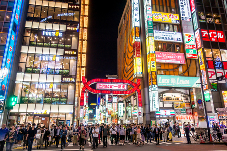 Tokyo, Japan - May 5, 2017: People are crossing Shinjuku shopping street.のeditorial素材
