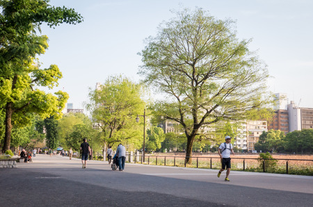 Tokyo, Japan - May 8, 2017: People are running around the lake in Ueno park.のeditorial素材