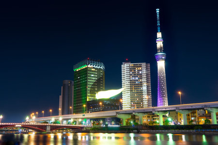 Tokyo, Japan - May 2, 2017: Tokyo Skytree and Asahi building is lighten up at night.