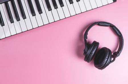 Music Studio Keyboard and Headphone on pink copy spaceの写真素材