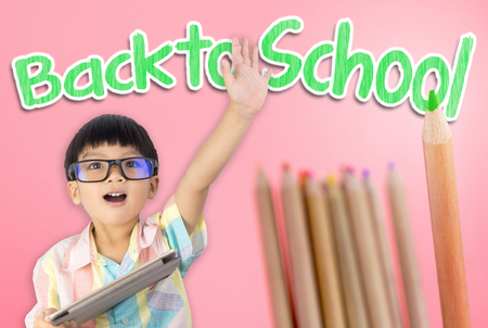 Kid raise hand ready to go back to schoolの写真素材