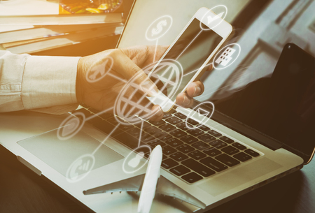 Business man is booking Travel Agency online with AR 3D iconsの写真素材