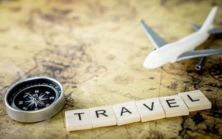 Vintage travel equipment with air plane for world travel conceptの写真素材