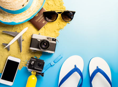 Summer Beach Vacation travel accessories and fashion on blueの写真素材
