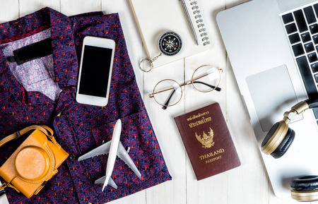 Hipster travel blogger writer accessories flatlay on white woodの写真素材