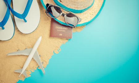 Summer travel fashion for Summer vacation on sandy blue copy spaceの写真素材