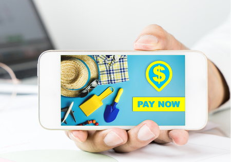 Business man holding a smartphone for Online Store pay now payment.の写真素材