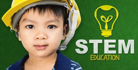 Asian boy with Engineer hat and STEM education logoの写真素材