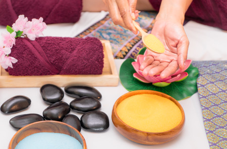 Spa Therapist is preparing salt for body scrubbingの写真素材