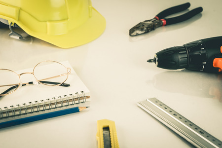 Construction handy man repair tools  on white tableの写真素材
