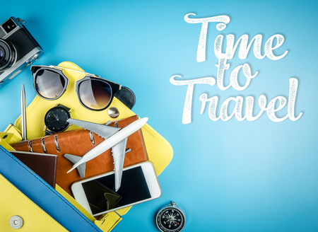 Women travel accessories out of a hand bag for travel timeの写真素材