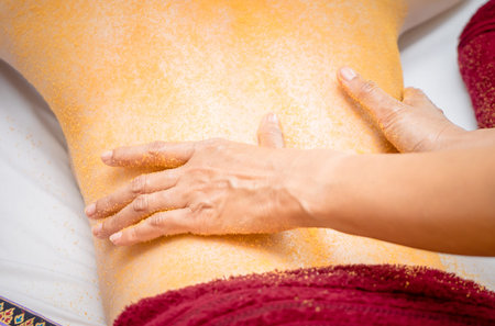 Women is getting a Thai style back scrubの写真素材