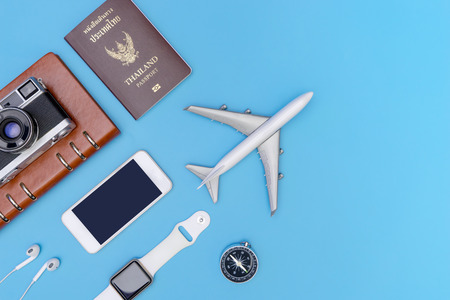 Travel object and accessories on blue copy spaceの写真素材