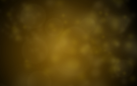 Golden Blur bubble Bokeh on black backgroundの写真素材