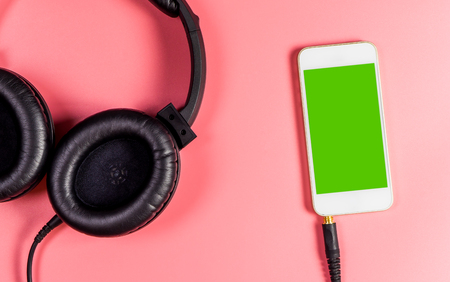 Blank smartphone screen for Music application with headphoneの写真素材