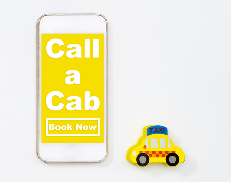 Use your Mobile to call up a taxi cap conceptの写真素材