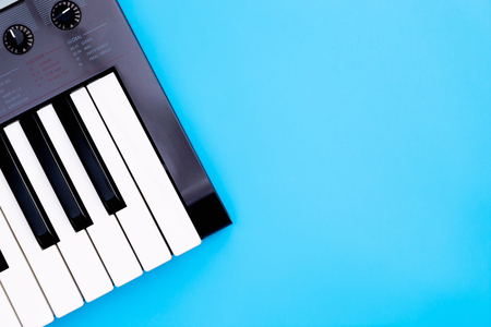 Music keyboard synthesizer instrument on blue copy space for Music poster conceptの写真素材
