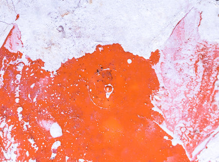 Orange Plastic surface with white paint stained textureの写真素材