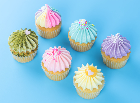 Colorful Cupcake for festival celebrate tion top view on blue backgroundの写真素材