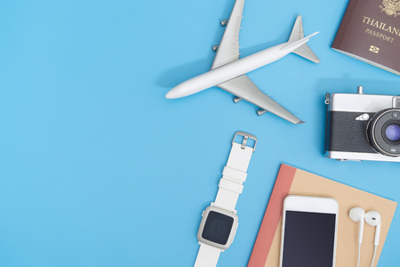 Travel blogger object on blue copy space for travel conceptの写真素材