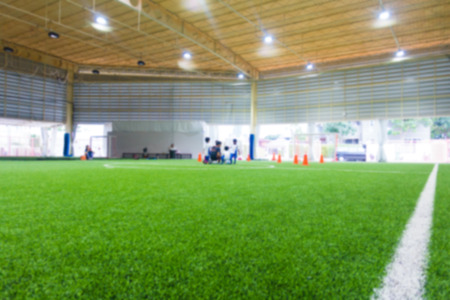 Indoor soccer training field blur abstract for backgroundの写真素材